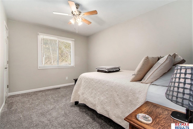 bedroom featuring ceiling fan and carpet