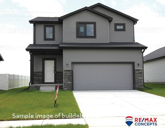 view of front facade featuring driveway, a garage, fence, and a front yard