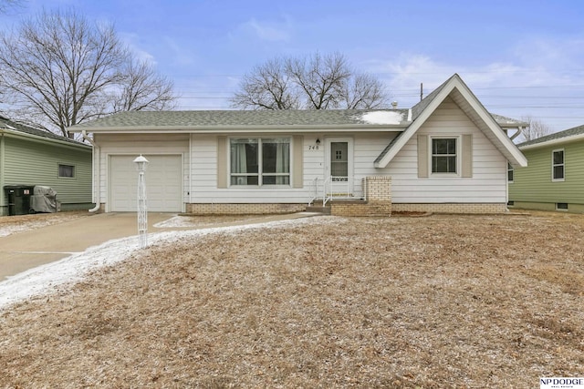 view of front of property featuring a garage