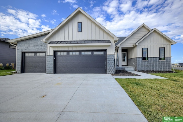 modern farmhouse featuring a garage and a front yard