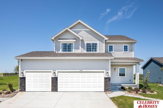 craftsman house featuring a garage