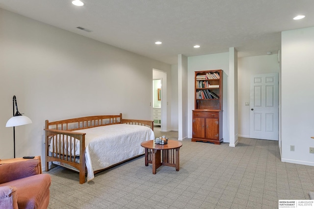 bedroom with light carpet