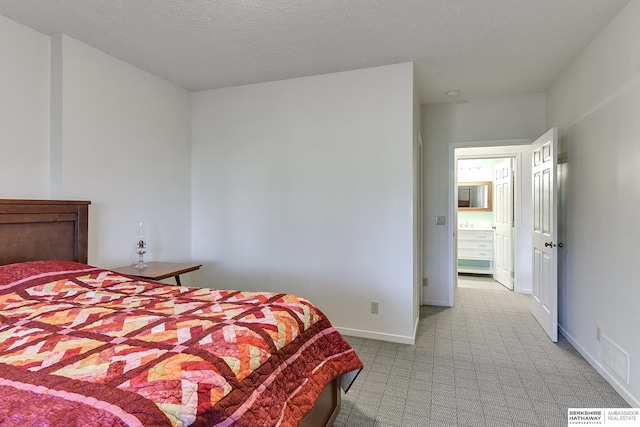 bedroom with a textured ceiling