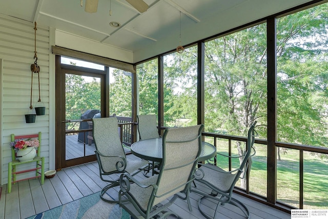 sunroom / solarium with ceiling fan