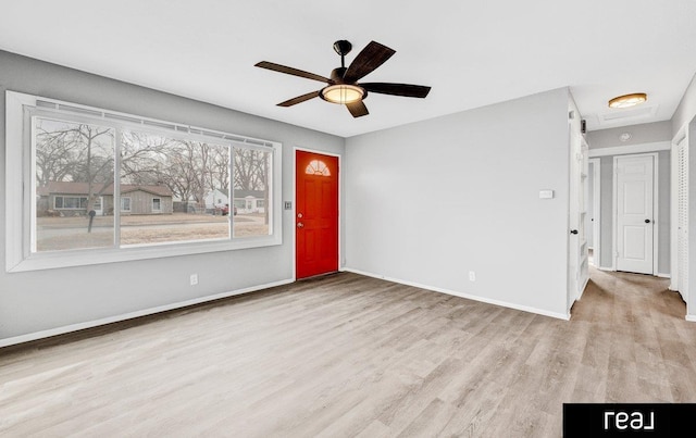 interior space featuring ceiling fan and light hardwood / wood-style floors