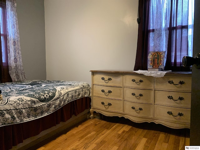 bedroom featuring light wood-type flooring