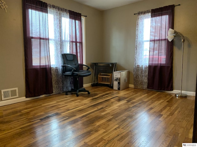 office space featuring dark hardwood / wood-style flooring