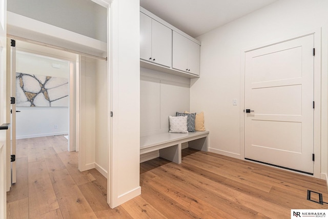 mudroom with light wood-type flooring