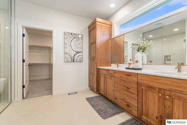 bathroom featuring vanity and walk in shower