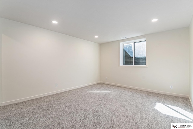 empty room with carpet flooring