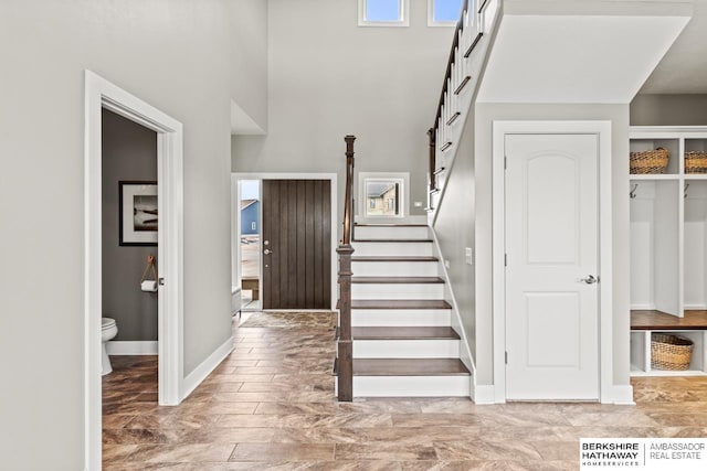 stairs with a towering ceiling