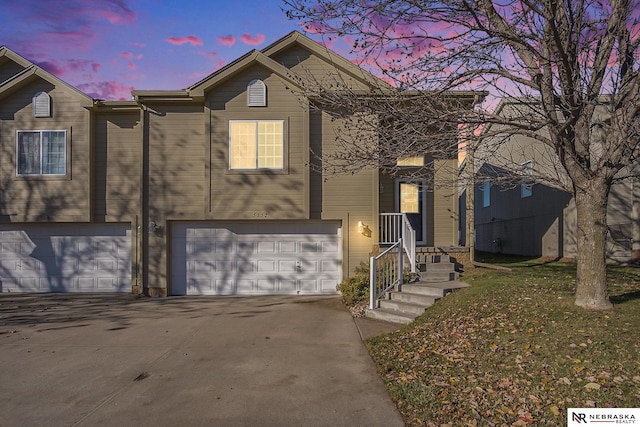 view of front of property with a garage