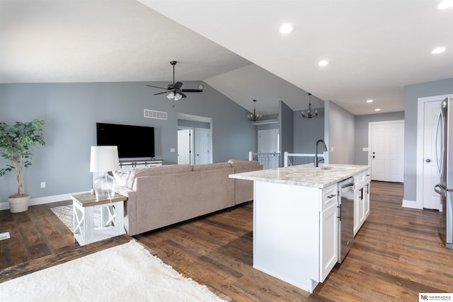 kitchen with sink, a center island with sink, dark hardwood / wood-style flooring, stainless steel appliances, and white cabinets