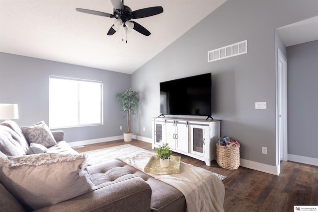 living room featuring ceiling fan, lofted ceiling, and dark hardwood / wood-style flooring