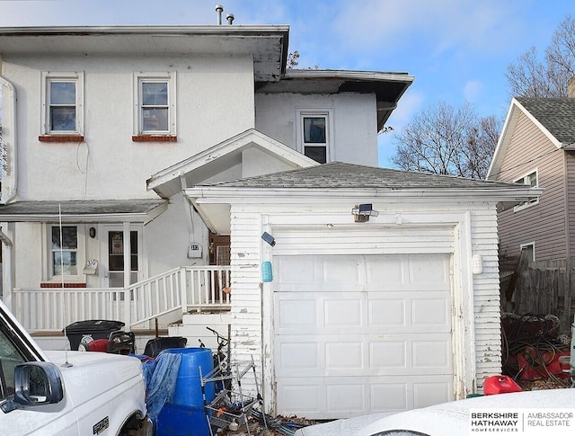 view of front of property featuring a garage