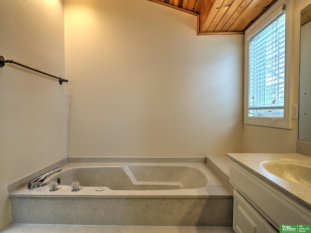 full bath with a bath, wooden ceiling, and vanity