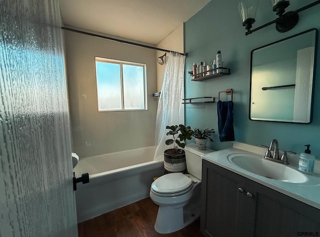 full bathroom featuring shower / bathtub combination with curtain, vanity, toilet, and hardwood / wood-style floors