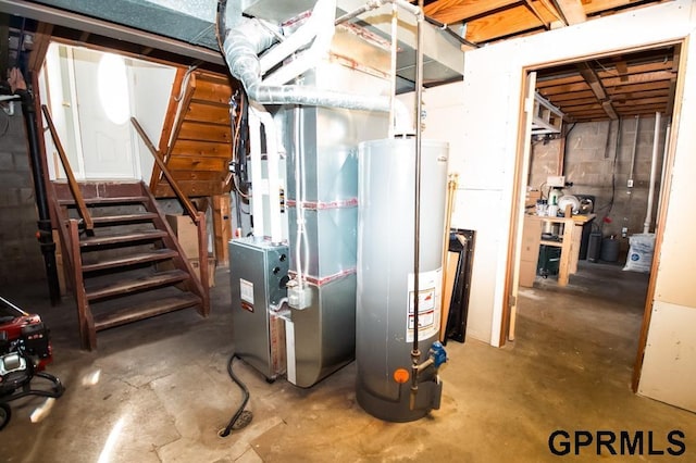 utility room featuring gas water heater