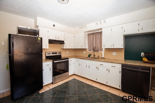 kitchen featuring light tile patterned flooring, white cabinets, sink, and black appliances