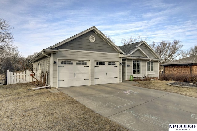 view of front of home with a garage