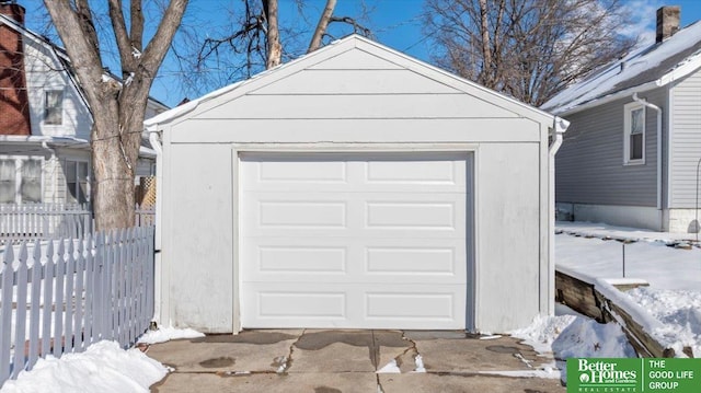 view of snow covered garage