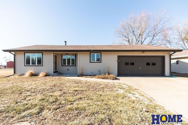 single story home featuring a garage