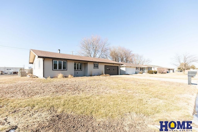 ranch-style house featuring a garage