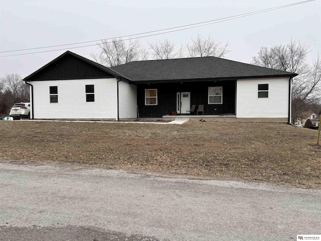 ranch-style home with covered porch