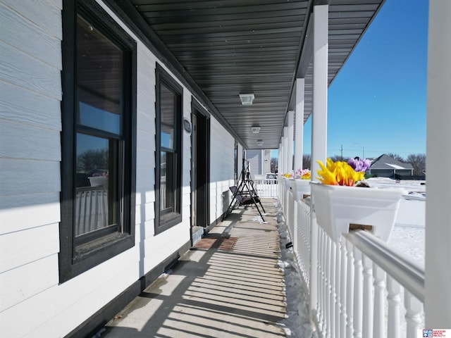 balcony featuring a porch