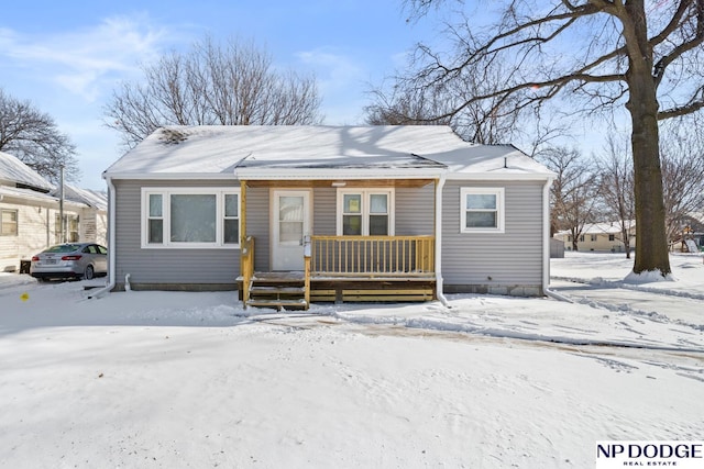 bungalow-style home with covered porch