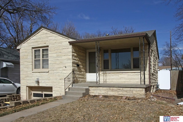 view of front facade featuring stone siding