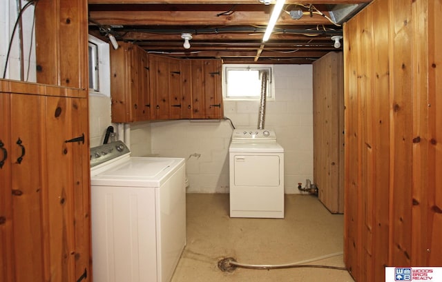 laundry area with laundry area and washing machine and clothes dryer