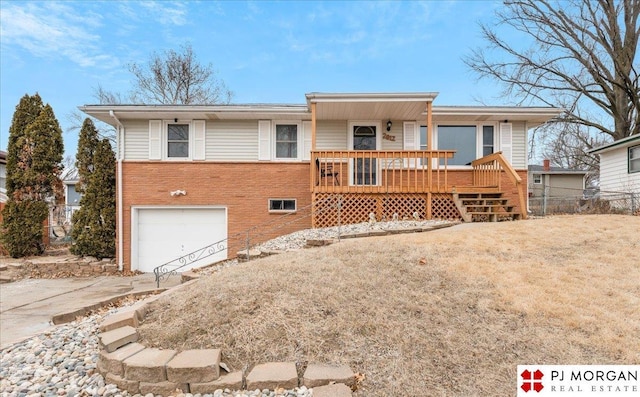 view of front of home featuring a garage and covered porch