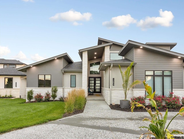 modern home with a front yard