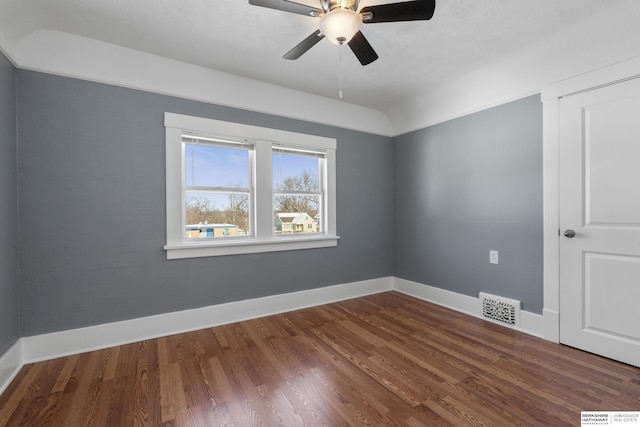 unfurnished room with hardwood / wood-style flooring and ceiling fan