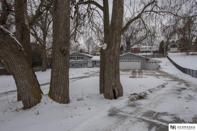 view of yard covered in snow