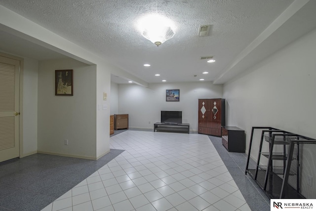 interior space featuring a textured ceiling