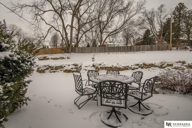 view of snow covered patio