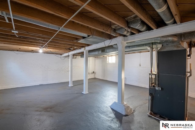 basement featuring heating unit