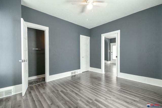 unfurnished bedroom with hardwood / wood-style flooring and ceiling fan