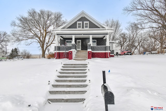 view of front facade featuring covered porch