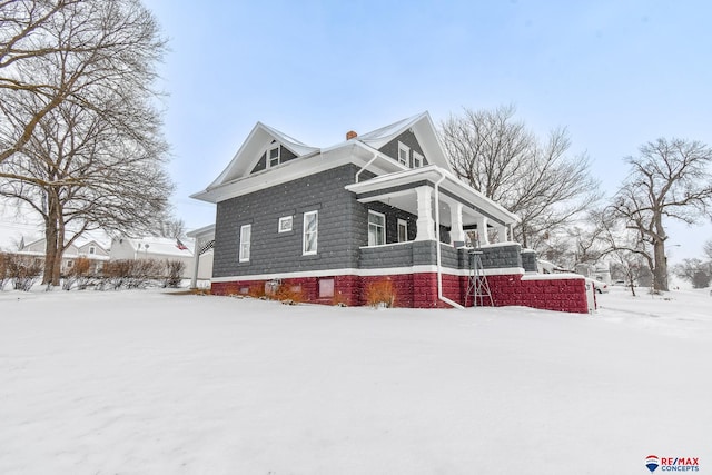 view of snow covered property