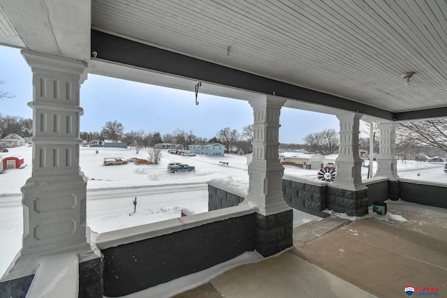 view of snow covered patio