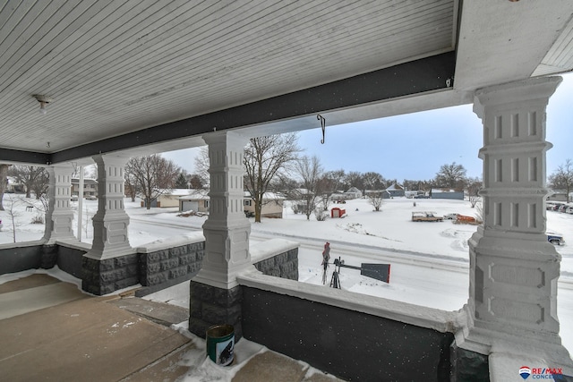 view of snow covered patio