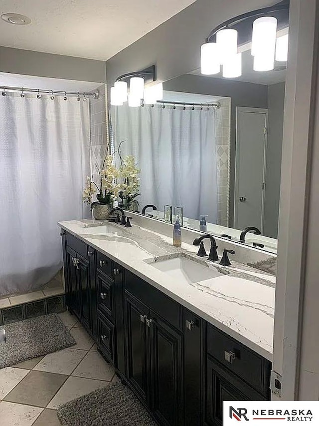 bathroom featuring vanity and tile patterned floors