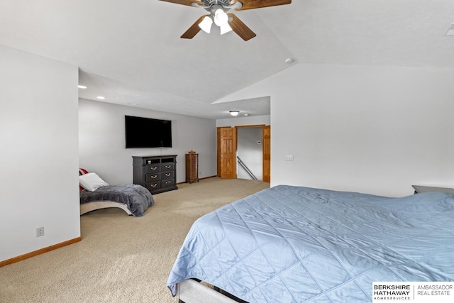 carpeted bedroom featuring ceiling fan and lofted ceiling