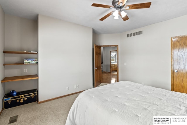 carpeted bedroom with ceiling fan