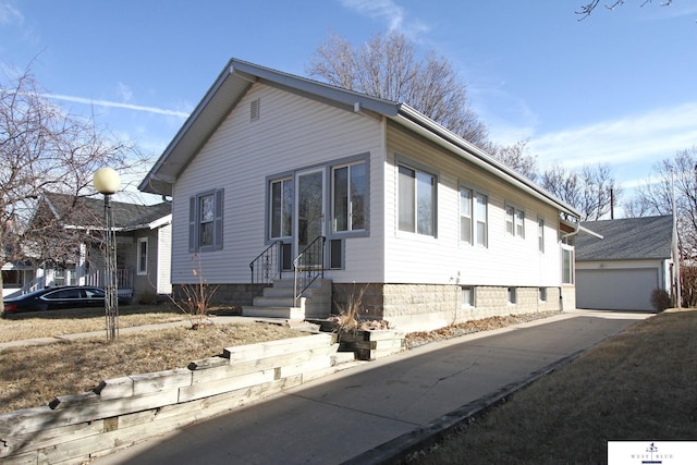 view of property exterior with a garage