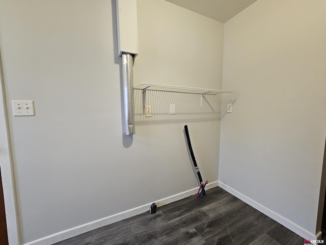 washroom with dark hardwood / wood-style floors