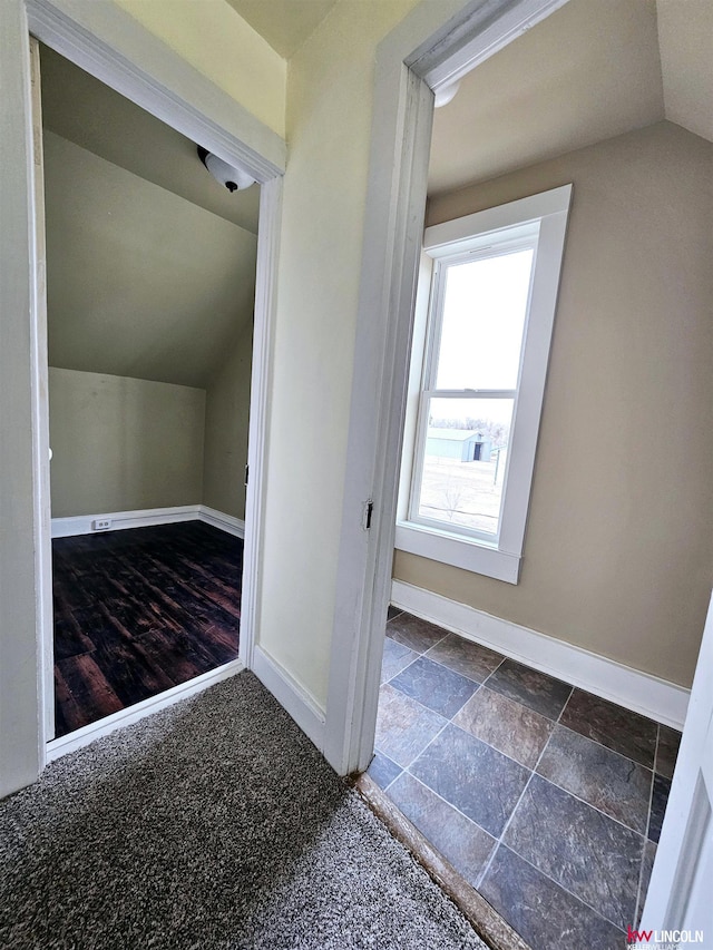 bonus room featuring lofted ceiling